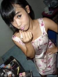 barefoot Oriental shemale teen posing for free sex gallery